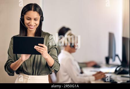 Call center, woman and manager with a tablet, telemarketing and connection with digital planning, schedule for staff and typing. Female person, client Stock Photo