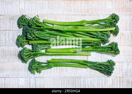 Broccolini on a light wooden base Stock Photo