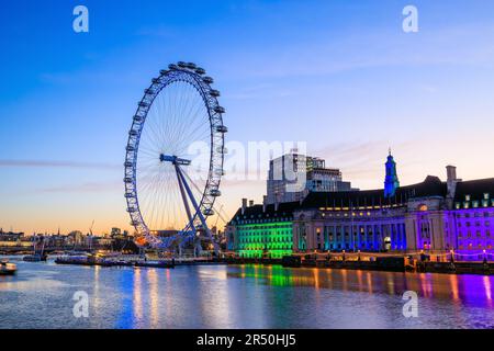 London, United Kingdom. London Eye and County Hall at sunrise. Stock Photo