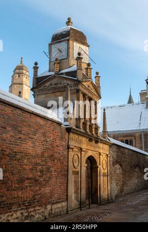 The Gate of Honour stands in Senate House Passage on a snowy, winters day in Cambridge, UK. Stock Photo