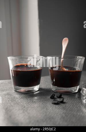 Chocolate flan in glasses Stock Photo