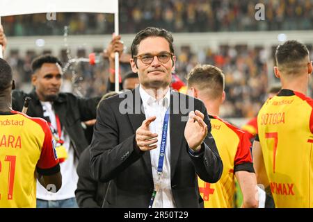 players of RC Lens and their president Joseph Oughourlian pictured  celebrating after winning and qualifying for the Champions League after a  soccer game between t Racing Club de Lens and AC Ajaccio