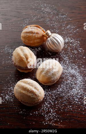 Christmas cookies in the shape of walnuts with chocolate filling Stock Photo