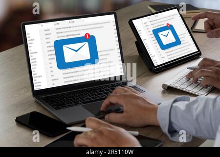 two businessmen digital computer tablet touch Mail Communication Connection message to mailing contacts phone Global Letters Concept Stock Photo