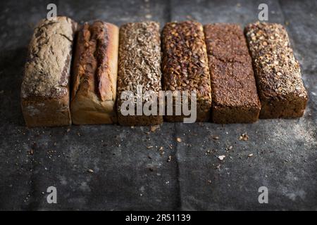 Various loaves in a row Stock Photo