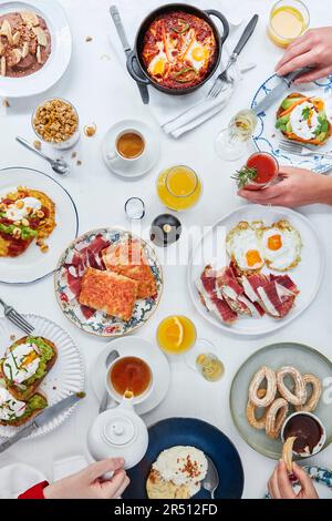 Richly set breakfast table Stock Photo