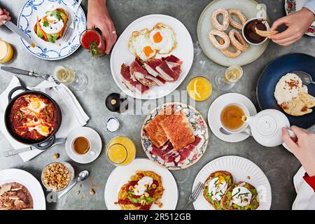 Richly set breakfast table Stock Photo