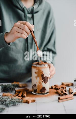 Winter beverage with oat milk, peanut butter and cinnamon Stock Photo