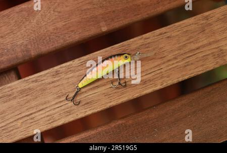 Artificial bait in the form of a fish with hooks for fishing isolated on  white background Stock Photo - Alamy