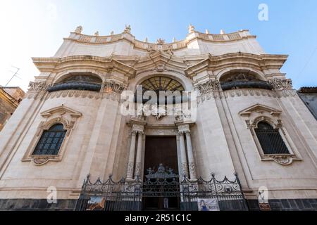 The Baroque style church facade of Badia di Sant'Agata or Abbey of St Agatha  church and attached female convent.  Via Vittorio Emanuele 182. Catania, Stock Photo
