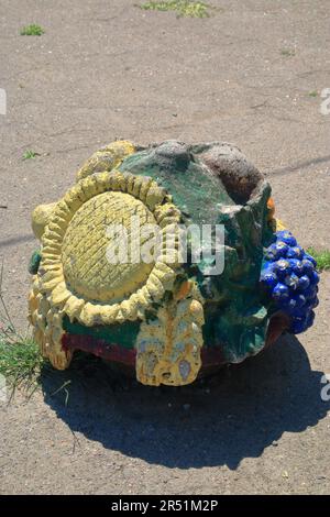 The photo was taken in the city of Odessa in Ukraine in a public park called Dyukovsky Garden. The photo shows an old concrete park decoration from th Stock Photo
