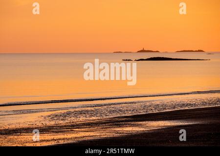 Sunset on Rhosneigr beach, Anglesey, Wales, UK Stock Photo