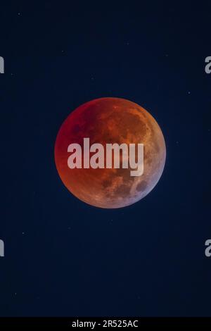 Total Eclipse Of The Moon - The Beaver blood full moon during a total eclipse of the moon.   This image is also available as a black and white.   To v Stock Photo