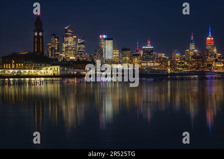 The NYC skyline all lit up tonight in red, white, and blue for Presidents Day! The NYC skyline was absolutely breathtaking tonight, as it was lit up i Stock Photo