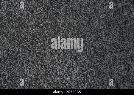 The texture of the black plastic ribbed surface for background Stock Photo