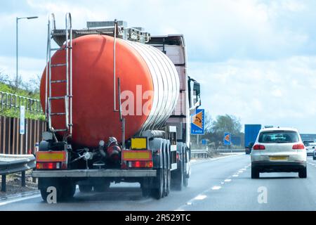 A fuel tanker traveling along a motorway in the United Kingdom Stock Photo