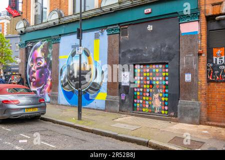 Artwork on the walls of a building on Hoxton square. Stock Photo