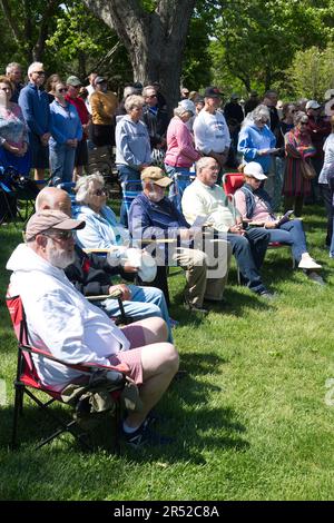 Memorial Day Event.  Dennis, Massachusetts, (Cape Cod) , USA.  Group of seniors and veterans watching Stock Photo