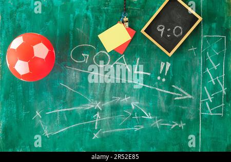 Soccer or football sport concept with soccer ball, referee whistle and accessoires, red and yellow cards, free copy space Stock Photo