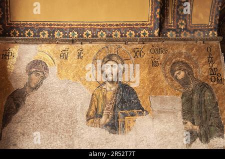 Deesis Wall Mosaic, St. Sophia Church, Ayasofya Camii Muezesi, St., Jesus between Virgin Mary and St. John the Baptist, Hagia Sophia, today Hagia Stock Photo