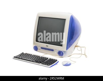 Los Angeles, California, USA - May 29, 2023:  Illustrative editorial photograph of vintage Apple iMac G3 desktop computer with keyboard and mouse. Stock Photo