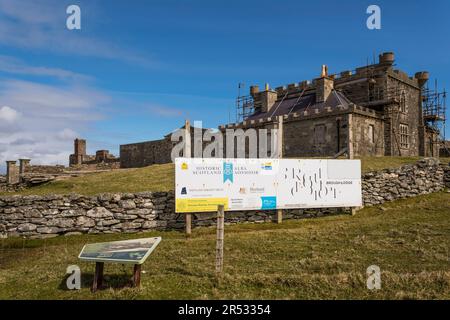 Brough Lodge on the island of Fetlar, Shetland, was built in 1820. Historic Scotland board gives details of restoration work by the Brough Lodge Trust Stock Photo