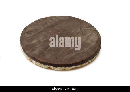 One dark chocolate covered rice cake snack isolated on white background Stock Photo