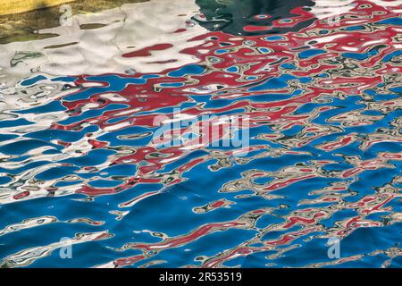 Colorful reflections on the surface of the sea Stock Photo