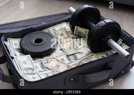 Open suitcase with one million dollars bills stacks Stock Photo