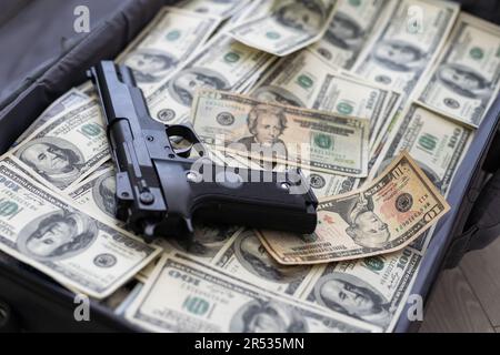 Open suitcase with one million dollars bills stacks Stock Photo