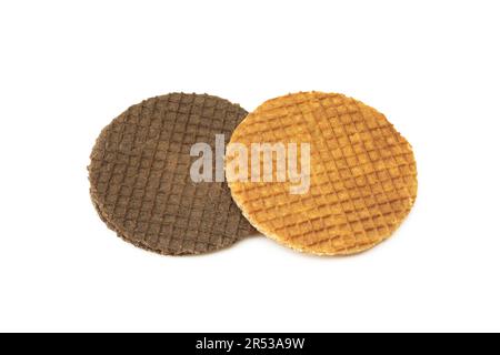 Two different round biscuits isolated on white background. Chocolate and regular golden stroopwafel dessert Stock Photo
