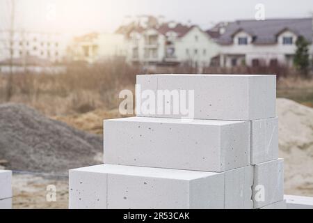 Aerated Concrete on house background. Unfinished house wall made from aerated autoclaved concrete blocks Stock Photo