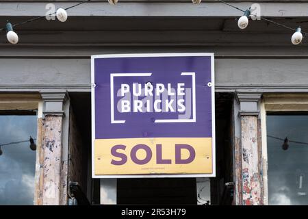 Purple Bricks sold sign Stock Photo