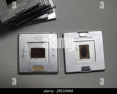 United States, May 31, 2023: Example of 1940s-1950s metal Minox 8 mm film glass slide mounts, made in Germany Stock Photo