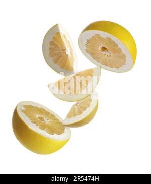 Fresh pomelo fruit falling on white background Stock Photo