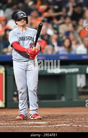 Minnesota Twins catcher Christian Vazquez (8) batting in the top of the fifth inning during the MLB game between the Minnesota Twins and the Houston A Stock Photo