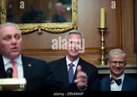 Speaker of the United States House of Representatives Kevin McCarthy, center, (Republican of California) and United States Representative Patrick McHenry, right, (Republican of North Carolina) listen while United States House Majority Leader Steve Scalise, left, (Republican of Louisiana) offers remarks following passage of H.R. 3746, the Bipartisan Budget Agreement, at the US Capitol in Washington, DC, Wednesday, May 31, 2023. Credit: Rod Lamkey/CNP Stock Photo