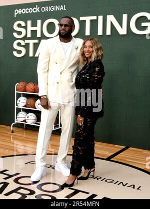 Basketball player LeBron James (R) and Savannah Brinson attend the 2013 ...