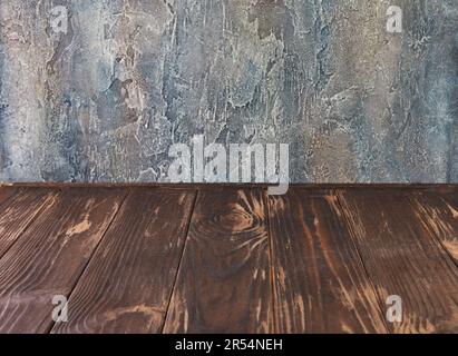 Background texture of dark brown wood and blue concrete for food and product photography. Stock Photo