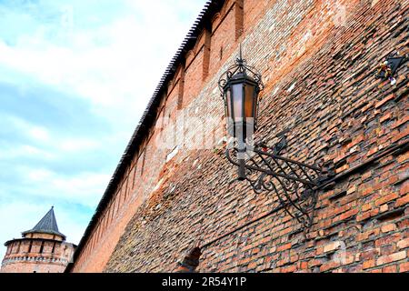 Metal lantern in vintage style on the fortress wall Stock Photo