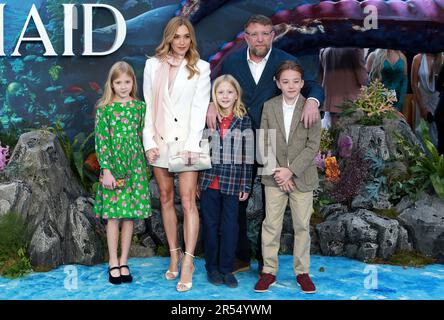 Guy Ritchie and Jacqui Ainsley attend the UK Premiere of 'The Little Mermaid' at Odeon Luxe Leicester Square on May 15, 2023 in London, England. Stock Photo