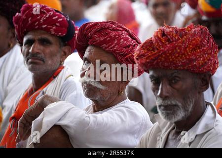 Ajmer, India. 31st May, 2023. Supporters listen to Indian PM during a rally in Rajasthan's Ajmer district, the first major event in a month-long outreach campaign by the BJP to mark nine years in power. Modi launched 'Maha Jansampark' campaign of the BJP by addressing a public meeting in Ajmer, Rajasthan, India, May 31, 2023. Under the Maha Jan Sampark campaign, scheduled to be held from May 31 (today) to June 30, extensive public programmes will be done across the country after the completion of 9 yrs at the Centre. Photo by ABACAPRESS.COM Credit: Abaca Press/Alamy Live News Stock Photo