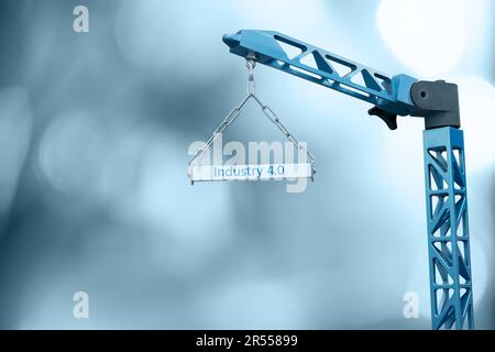 Symbolic construction crane with the inscription INDUSTRY 4.0. High quality photo Stock Photo