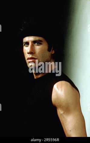 JOHN TRAVOLTA in STAYING ALIVE (1983), directed by SYLVESTER STALLONE. Credit: PARAMOUNT PICTURES / Album Stock Photo