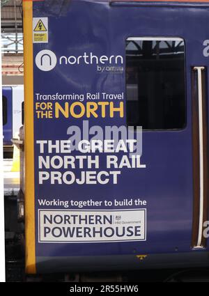 Manchester, UK  27 May 2023  The Northern Powerhouse advertising fitted onto the site of a train operated by Northern Rail, stabled at Manchester Piccadilly station. ©Ged Noonan/Alamy Stock Photo