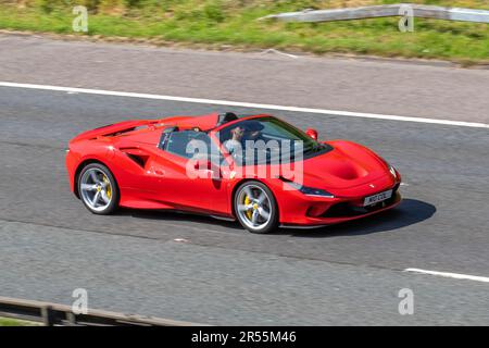 2021 red Ferrari F8 SPIDER S-A 3902cc petrol roadster, travelling on ...