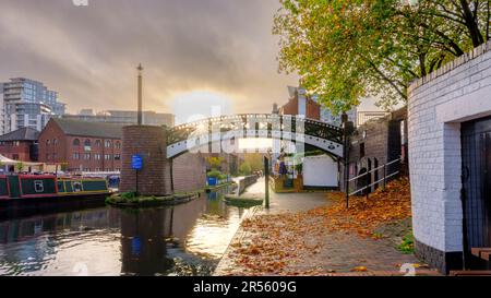 Birmingham, UK - October 31, 2022: Sunrise light on the canal interchange at Gas Street, Birmingham, UK Stock Photo