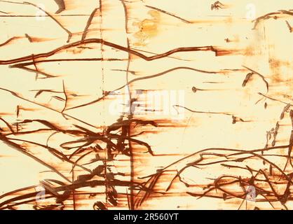 A red brown abstraction of scratched rusty lines and textures on an old weathered metal industrial surface. Random impact marks on a steel wall. Looks Stock Photo