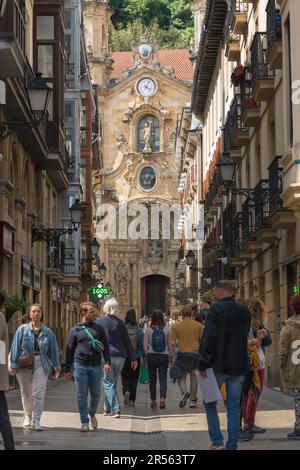 San Sebastian Spain, view in summer of people walking in the Calle Mayor -the main shopping street in the Old Town (Casco Viejo) area of San Sebastian Stock Photo
