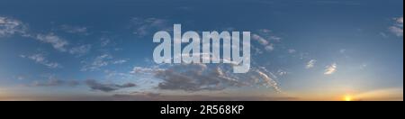 sunset skydome with evening clouds as seamless hdri 360 panorama view in spherical equirectangular format for use in 3d graphics or game development a Stock Photo